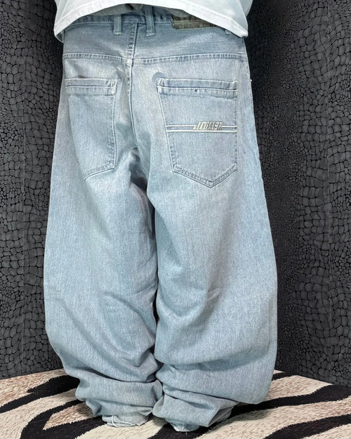 Joker baggy jeans, light blue wash – tonal Joker embroidery on the right back pocket – rear view, worn – vintage Y2K, size W34 / L, ships from Germany / Versand aus Deutschland