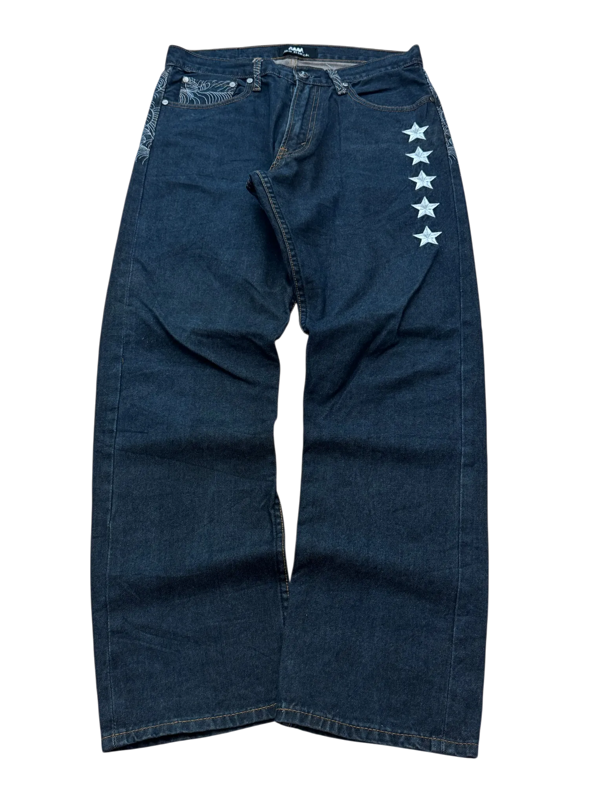 MM like black baggy jeans, dark indigo denim – row of white stars down the right front leg – flat lay, front – vintage Y2K, size W32 / M, ships from Germany / Versand aus Deutschland