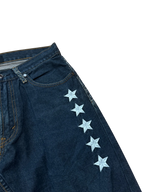 MM like black baggy jeans, dark indigo denim – tonal wave pattern with white stars across the yoke and back pockets – further detail shot (1 of 4) – vintage Y2K, size W32 / M, ships from Germany / Versand aus Deutschland